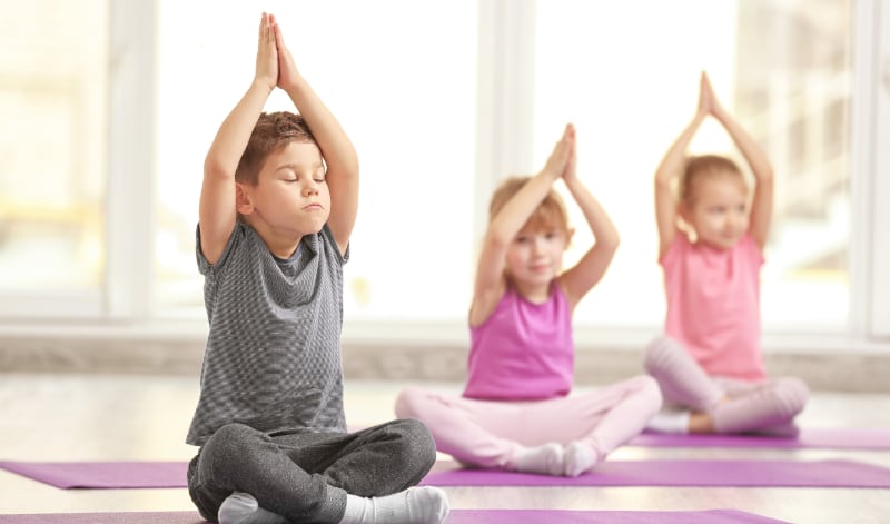 Children doing yoga